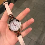 ar7437-emporio-armani-watch-women-crystals-white-dial-leather-beige-strap-quartz-battery-analog-chiara.webp