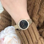 mk3738-michael-kors-watch-women-crystals-black-dial-metal-stainless-steel-gold-strap-quartz-battery-analog-three-hand-darci-mini.webp
