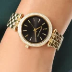 mk3738-michael-kors-watch-women-crystals-black-dial-metal-stainless-steel-gold-strap-quartz-battery-analog-three-hand-darci-mini.webp