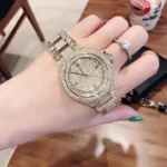 mk5720-michael-kors-watch-women-crystals-gold-dial-metal-stainless-steel-golden-strap-quartz-battery-analog-three-hand-camille.webp