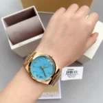 mk5894-michael-kors-watch-women-turquoise-blue-dial-metal-stainless-steel-gold-strap-quartz-battery-analog-three-hand-channing.webp
