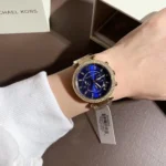 mk6262-michael-kors-watch-women-blue-dial-metal-stainless-steel-gold-strap-quartz-battery-analog-chronograph-parker.webp