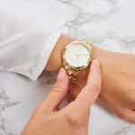 mk6689-michael-kors-watch-women-pyramid-white-dial-metal-stainless-steel-gold-strap-quartz-battery-analog-three-hand-runway.webp