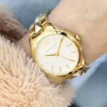 mk6689-michael-kors-watch-women-pyramid-white-dial-metal-stainless-steel-gold-strap-quartz-battery-analog-three-hand-runway.webp