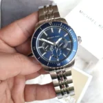 mk7153-michael-kors-watch-men-blue-dial-metal-stainless-steel-silver-strap-quartz-battery-analog-cunningham.webp