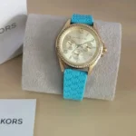 mk7374-michael-kors-watch-women-mk-logo-gold-dial-rubber-blue-strap-quartz-battery-analog-mini-pilot.webp
