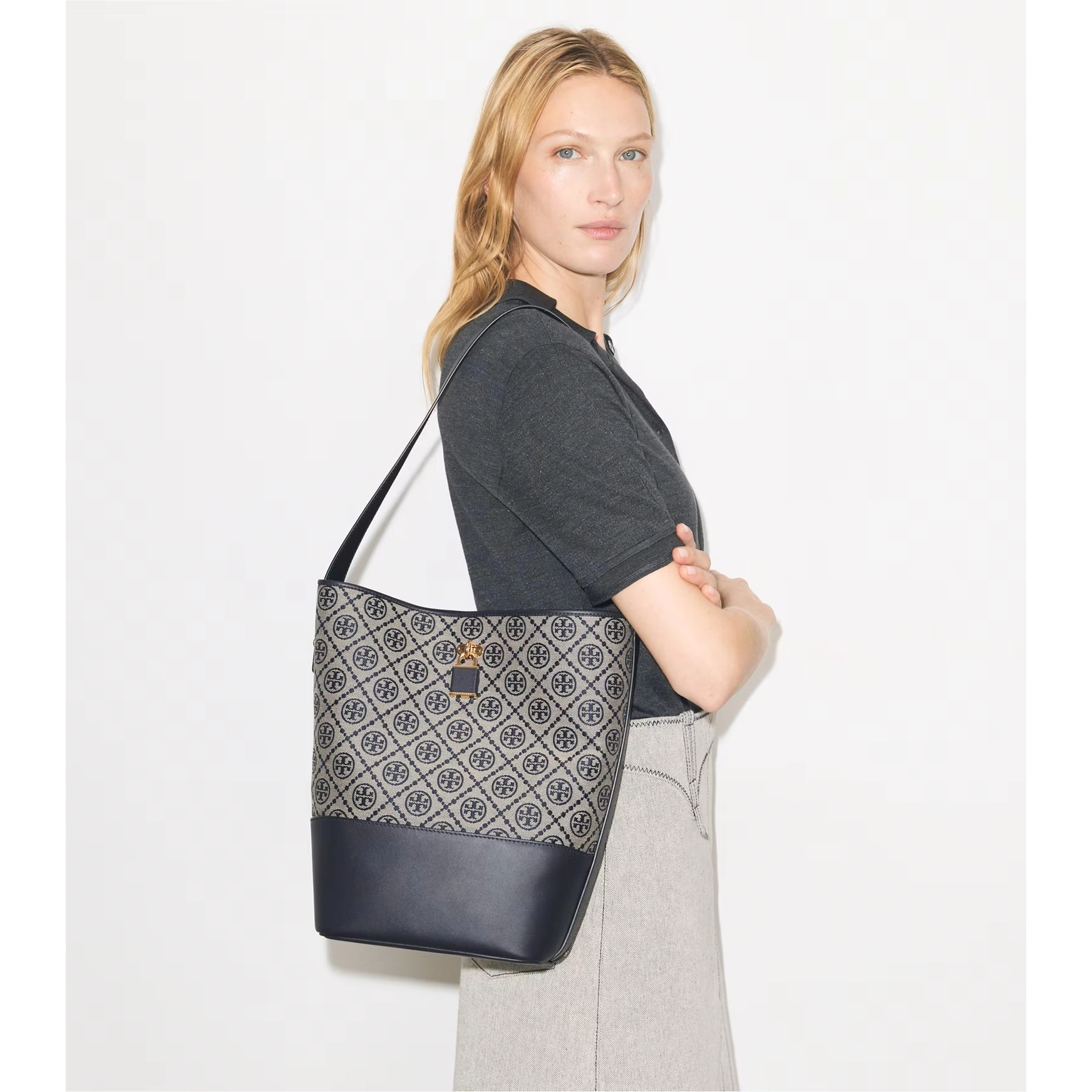 t-monogram-lock-slim-bucket-bag-accessory-on-model.tb_182859_405_20260409_omacc.pdp-1534x1744-2-outlet90-com